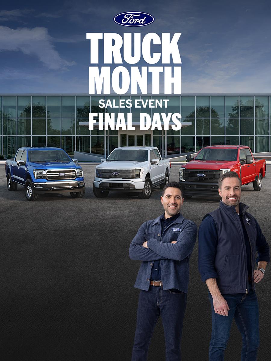Ford Dealership with a family of Ford trucks and the Ford Crew promoting the Truck Month Sales Event