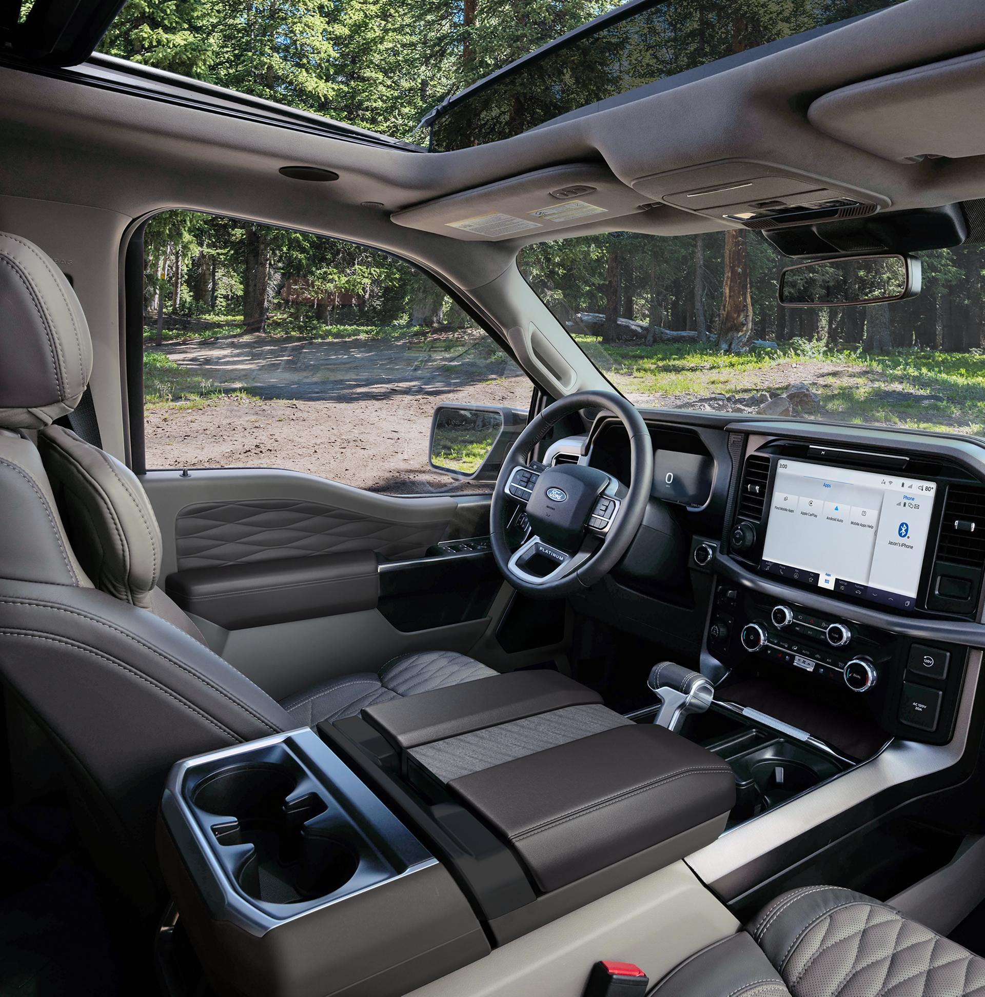 Interior of a 2026 Ford F-150® Platinum® model parked in a wooded setting