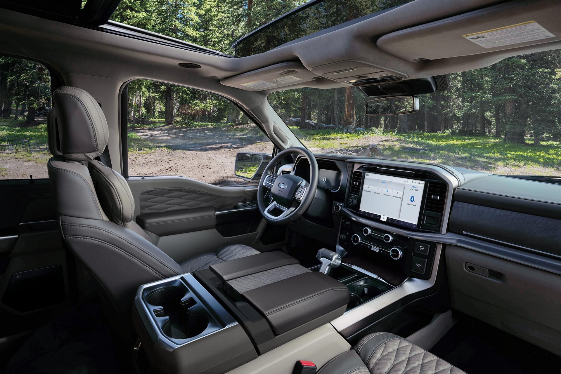 Interior of a 2026 Ford F-150® Platinum® model parked in a wooded setting