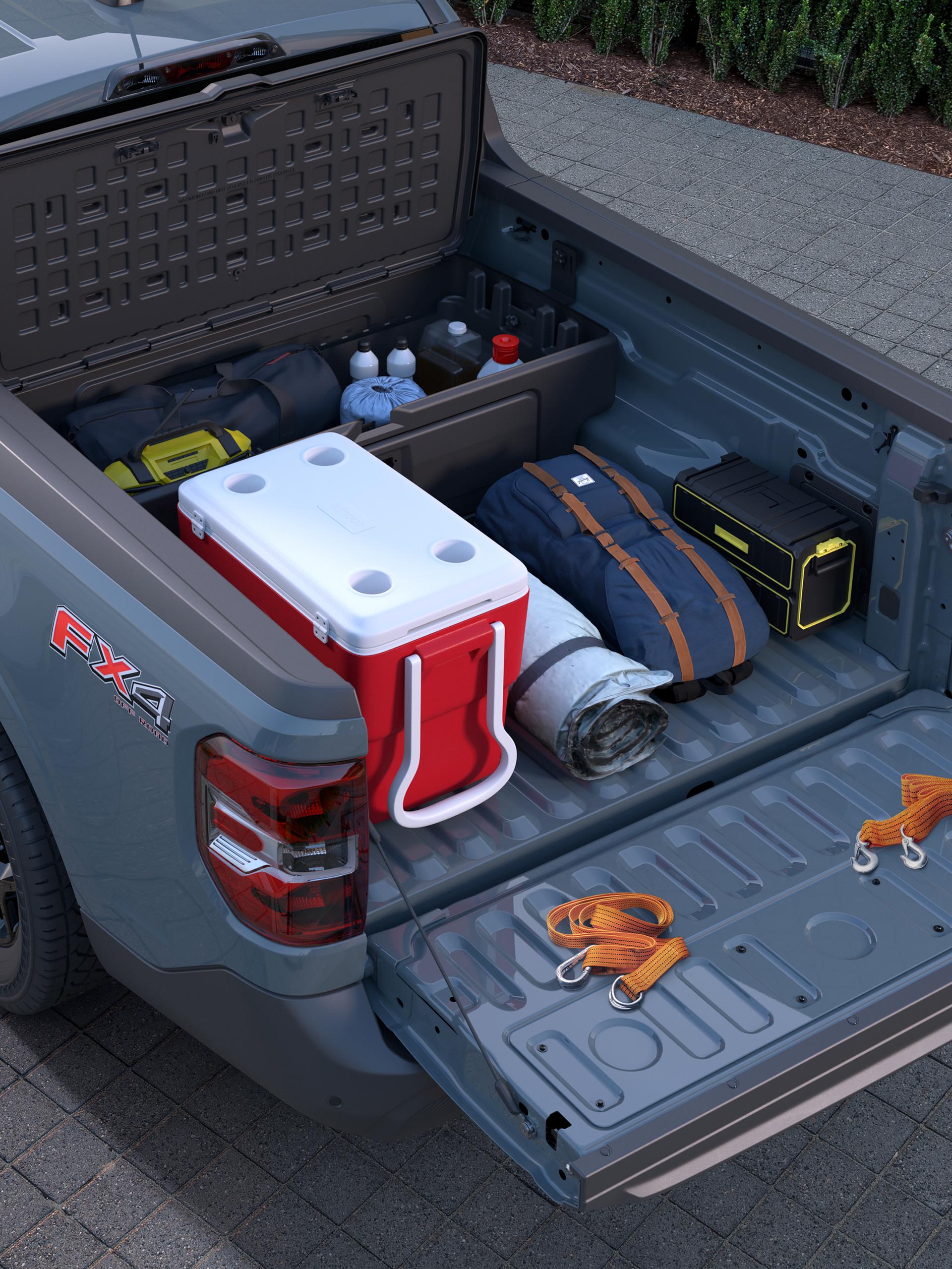 Ford accessories help keep belongings organized and in place in the bed of a Ford Maverick® truck