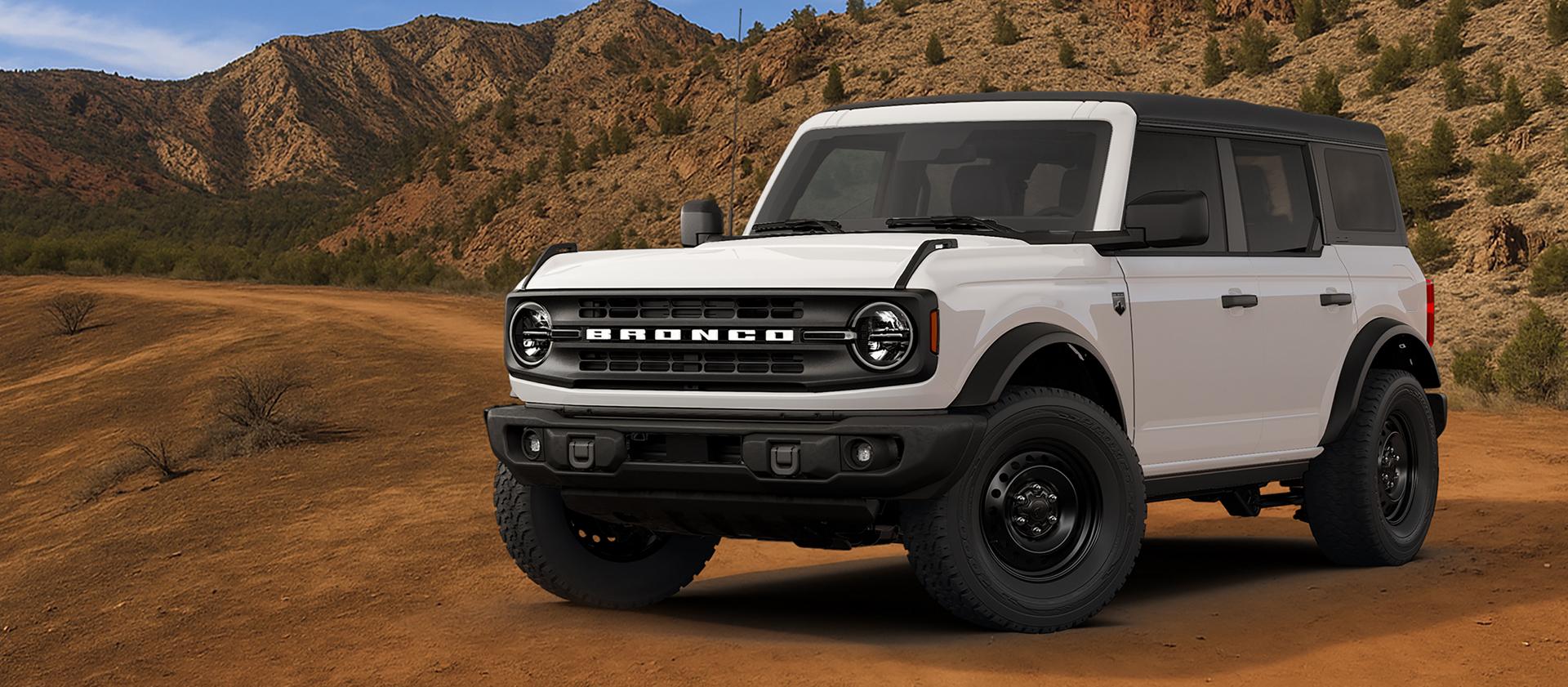 A 2026 Ford Bronco® Big Bend® SUV with the available Black Diamond™ package, parked on a desert flat