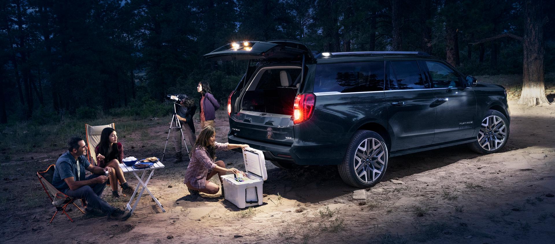 2027 Ford Expedition® MAX Platinum® SUV with available 360-degree Zone Lighting with people nearby