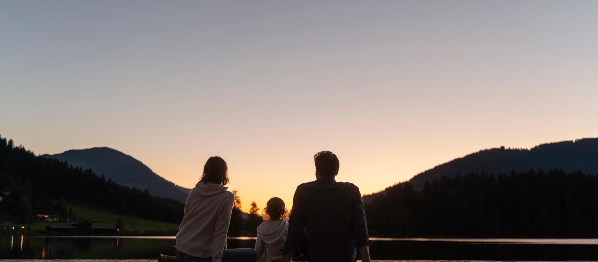  A family enjoys a sunset together