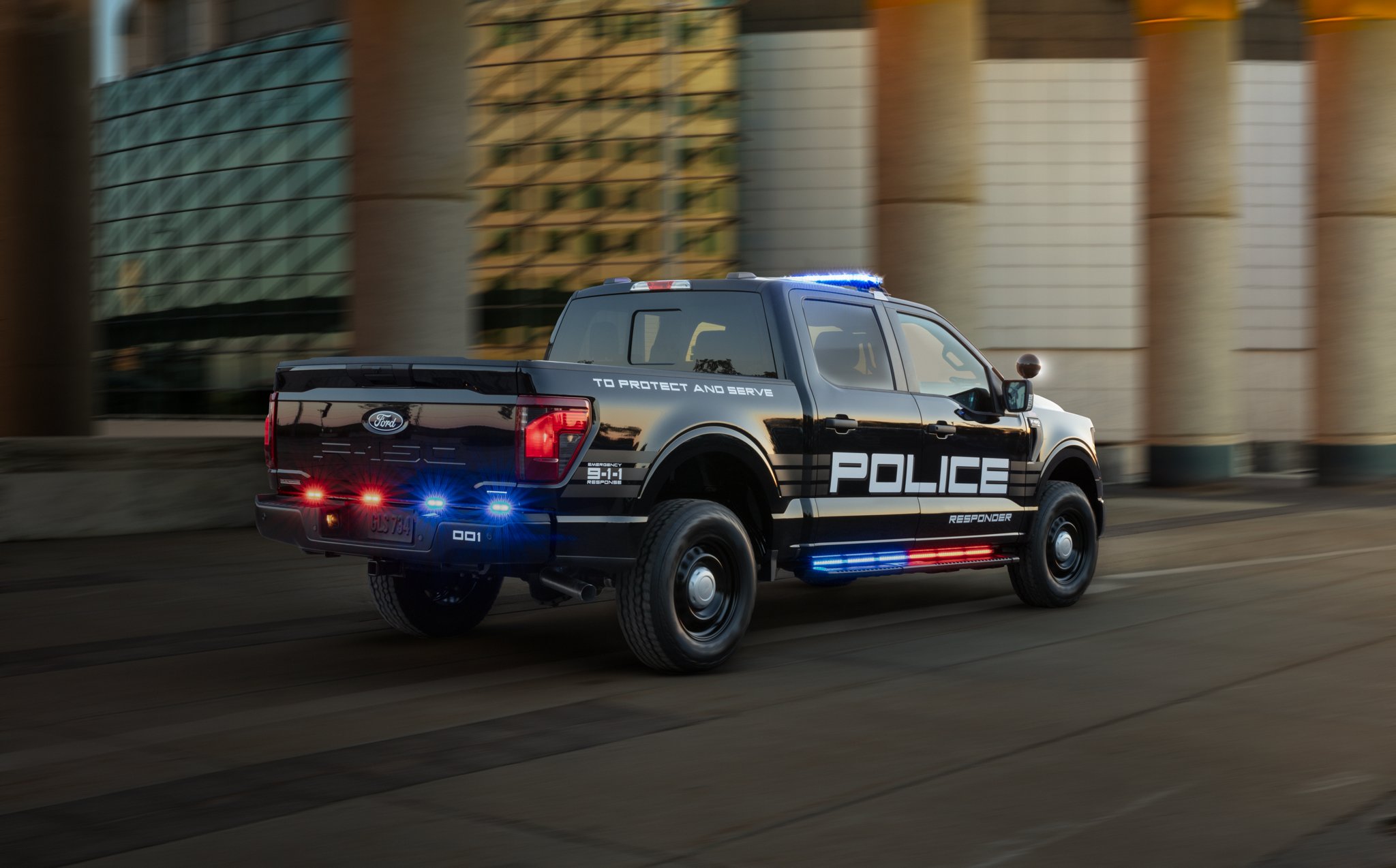 Rear view of the 2024 Ford F-150® Police Responder being driven on a city street