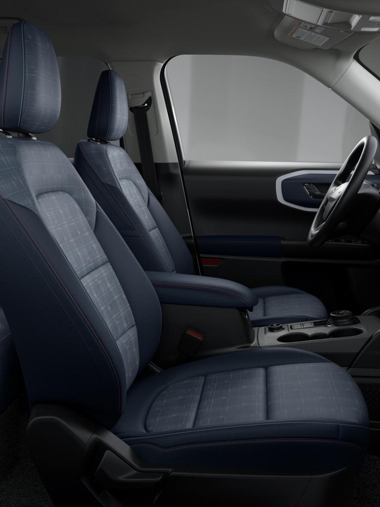 Interior of the 2026 Ford Bronco Sport® Heritage model with plaid seating