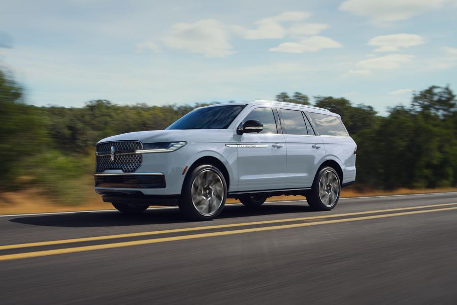 A 2026 Lincoln Navigator is driving down the road.