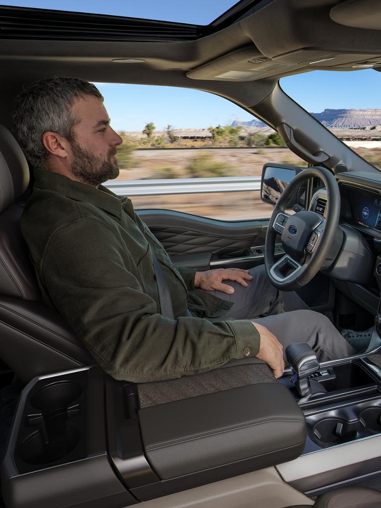 Man using the BlueCruise hands-free highway driving feature