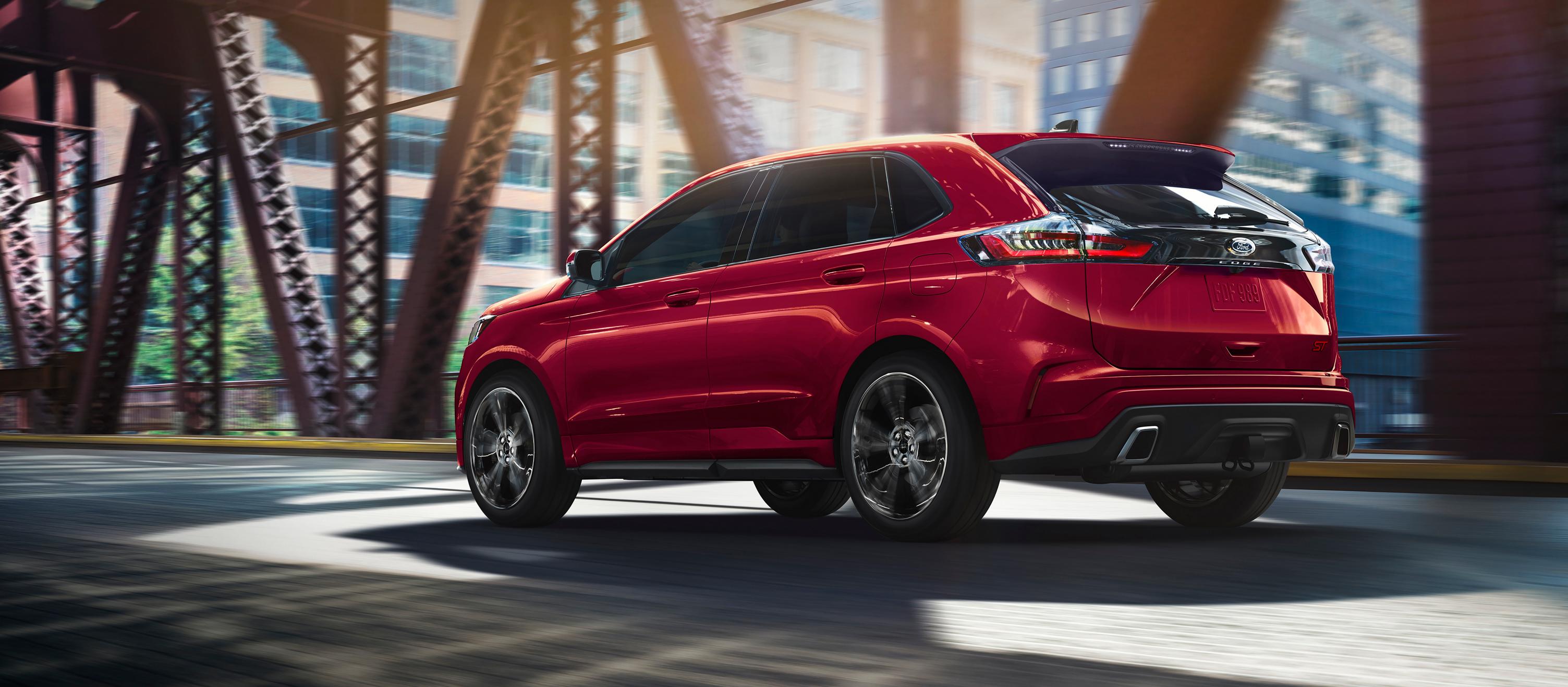 2025 Ford Edge® ST SUV being driven across a bridge