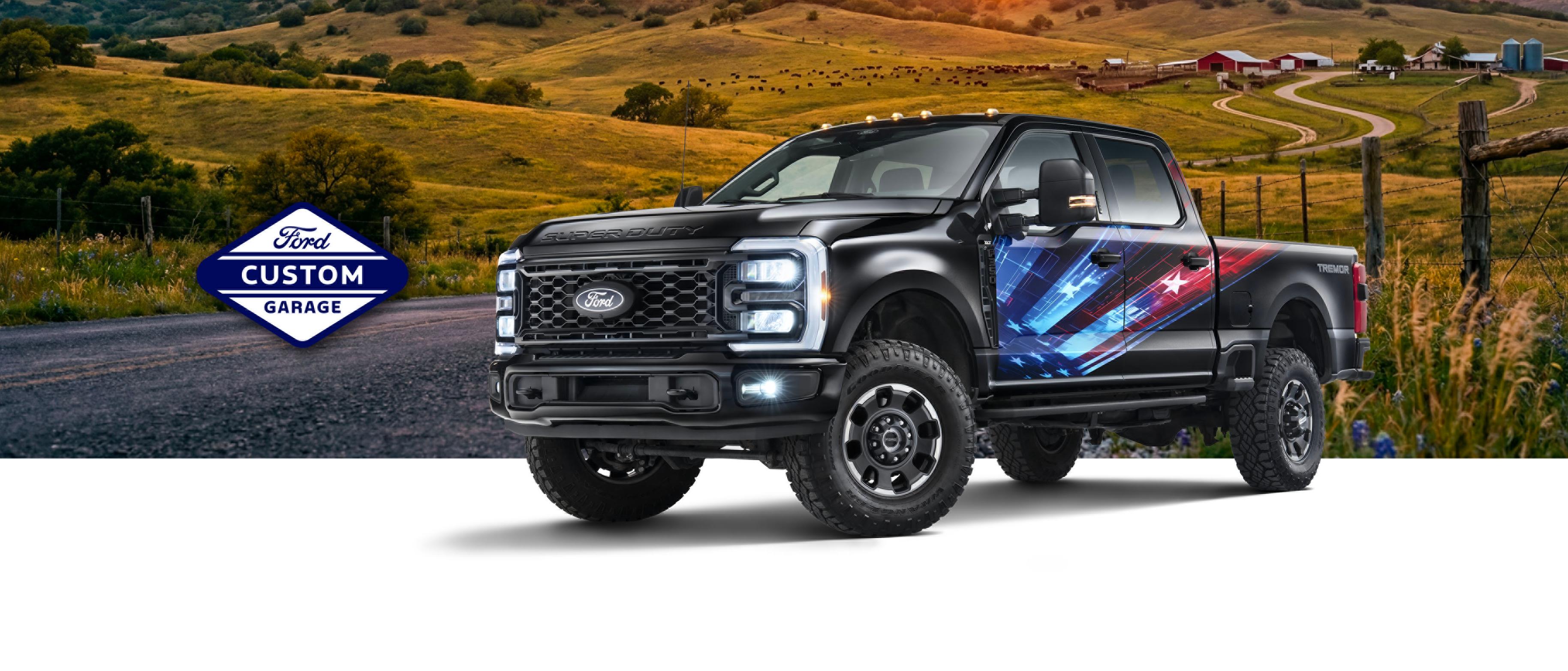 2026 Ford Super Duty® F-350® XLT model with the Proud to Honor Package against a hilly farm background