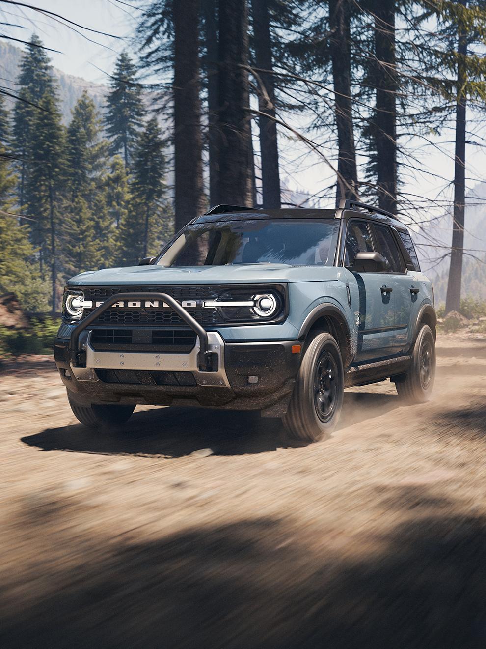 The 2026 Ford Bronco Sport® kicks up dust on a mountain trail
