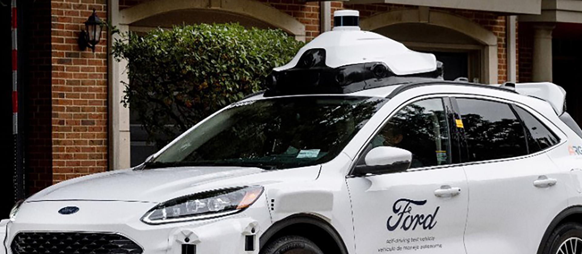 A white Ford autonomous vehicle