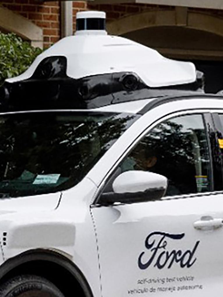 A white Ford autonomous vehicle