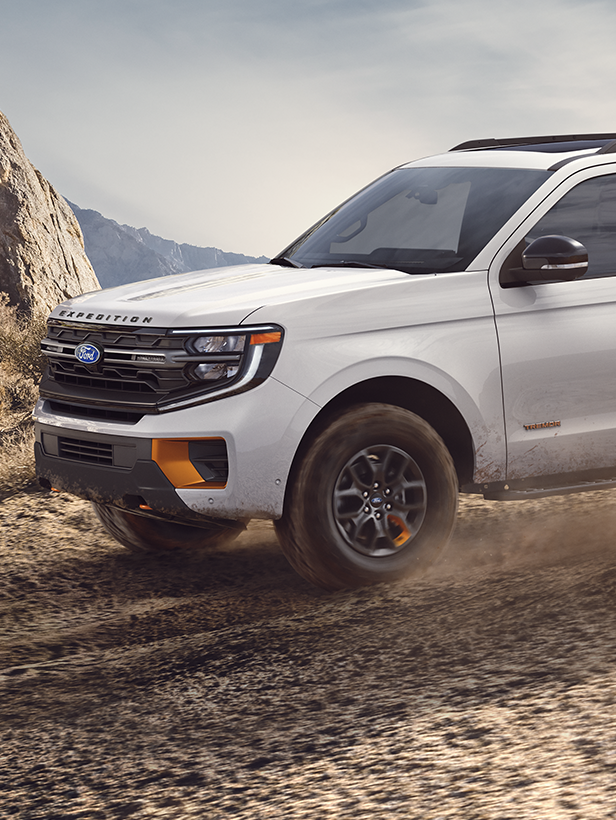 A 2027 Ford Expedition® being driven on a dirt path