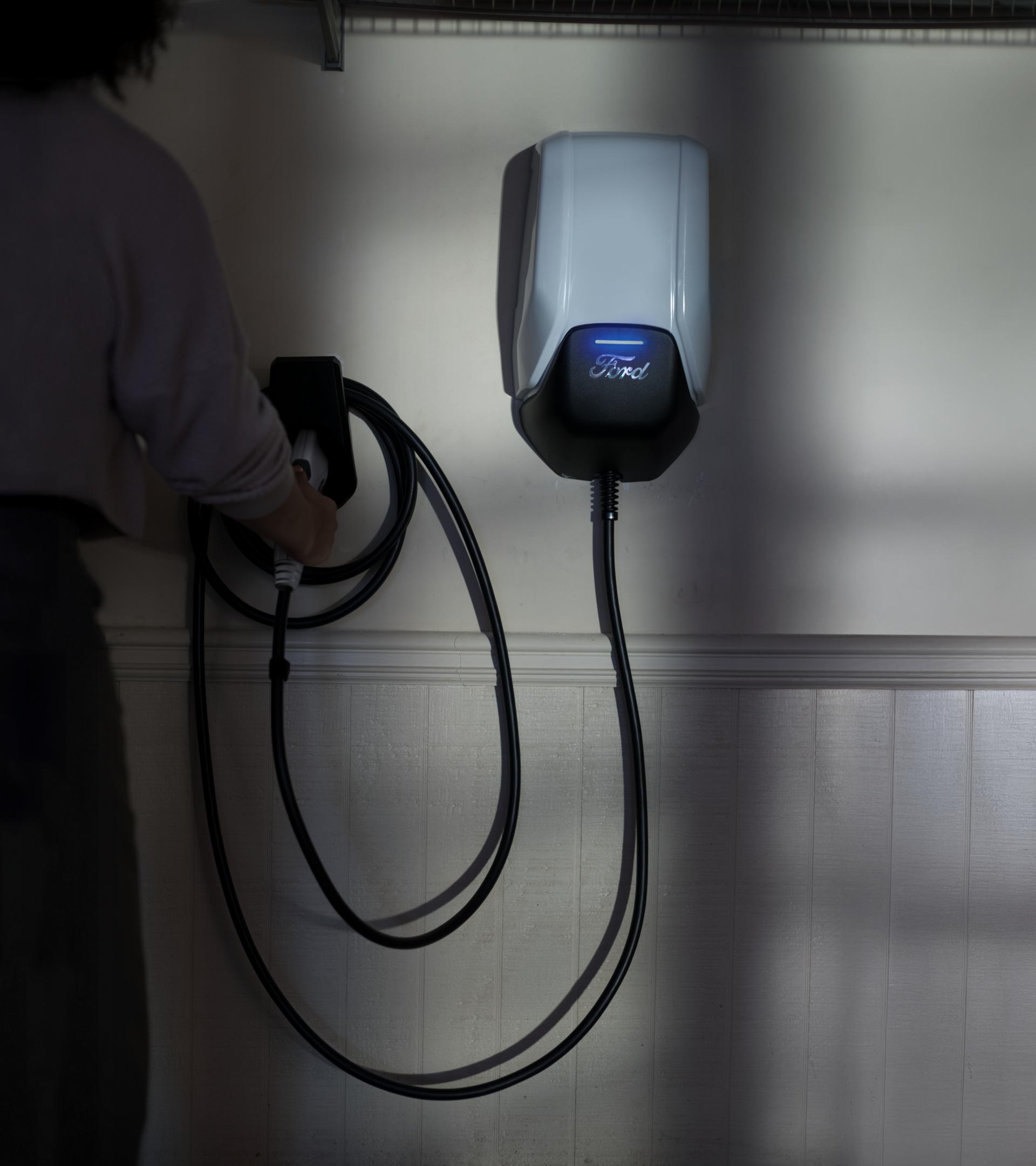 Ford charge station installed on interior wall of garage