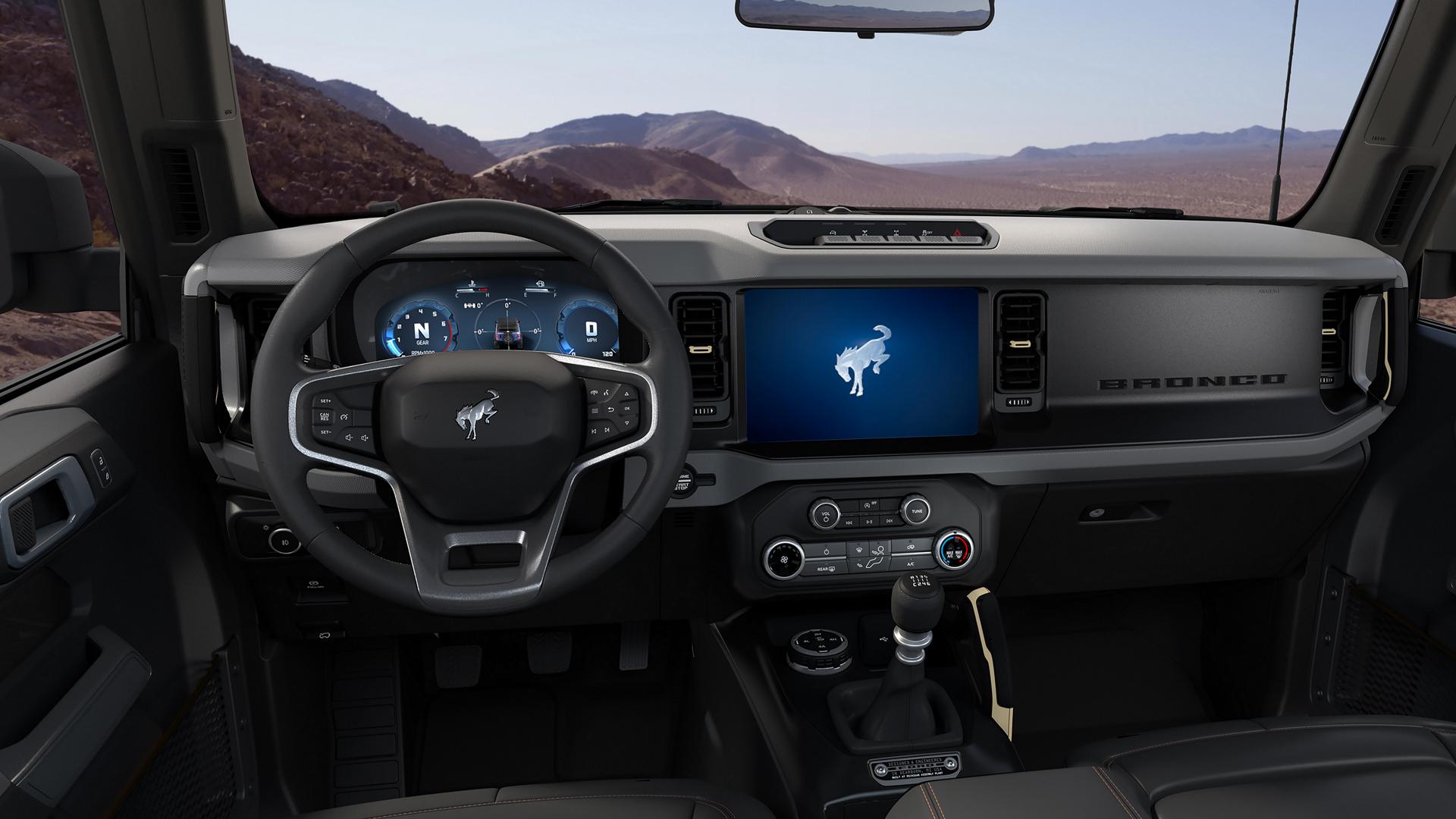 The dashboard of a 2026 Ford Bronco® SUV, showing the digital cluster and touchscreen