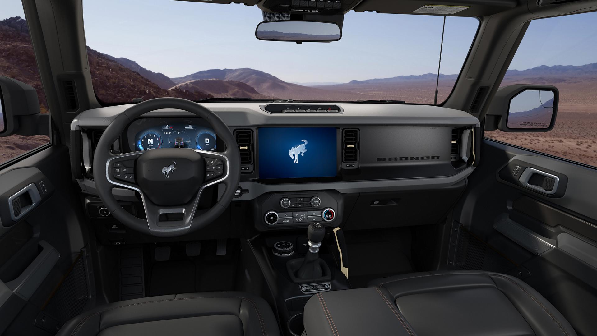 The dashboard of a 2026 Ford Bronco® SUV, showing the digital cluster and touchscreen