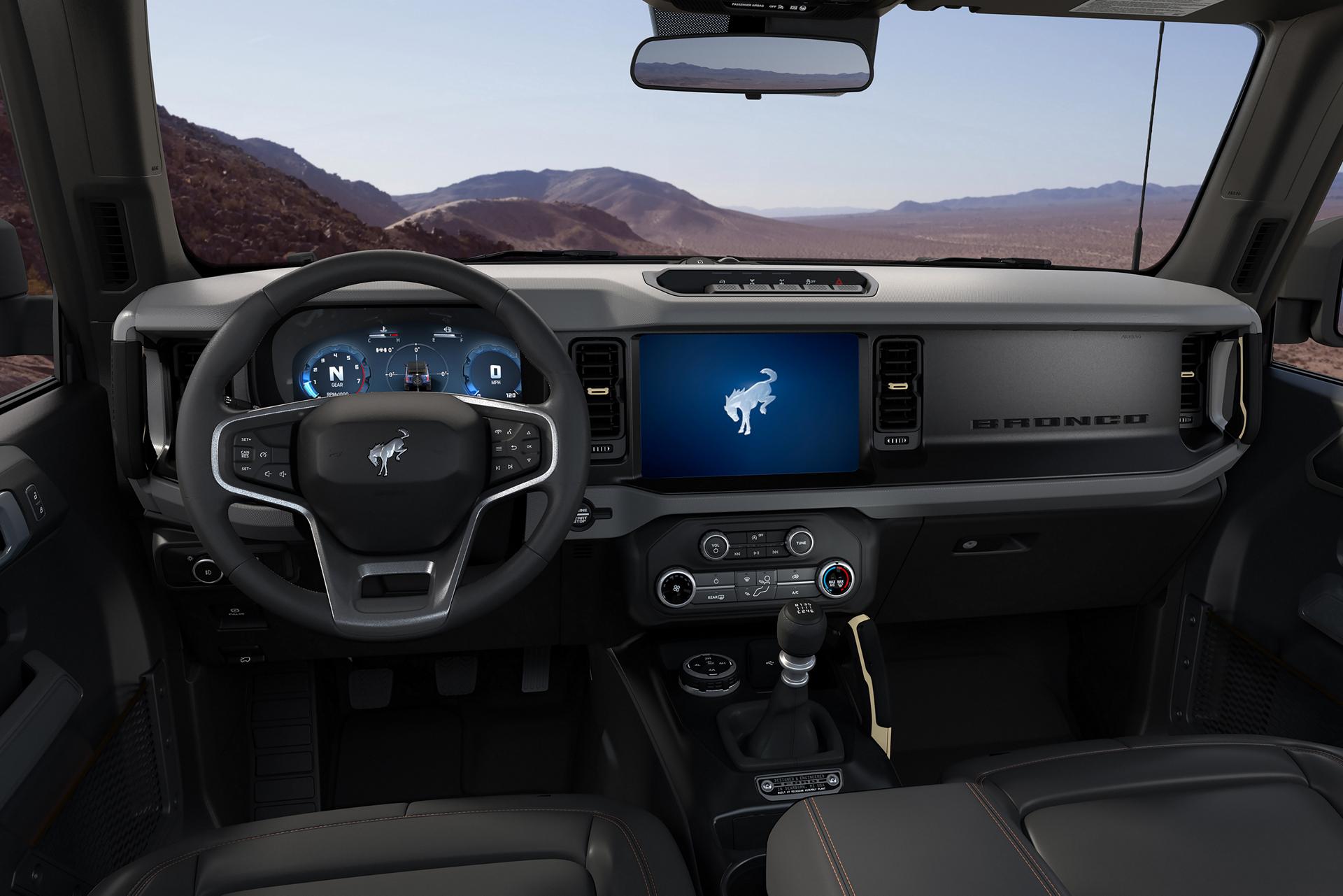 The dashboard of a 2026 Ford Bronco® SUV, showing the digital cluster and touchscreen