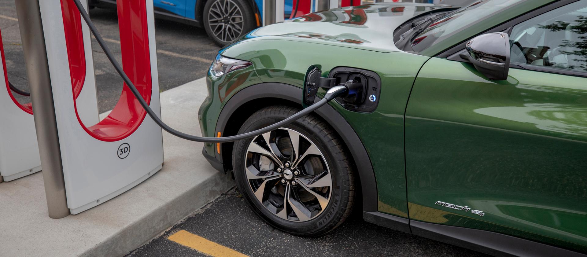 Ford Mustang Mach-E plugged into compatible charger