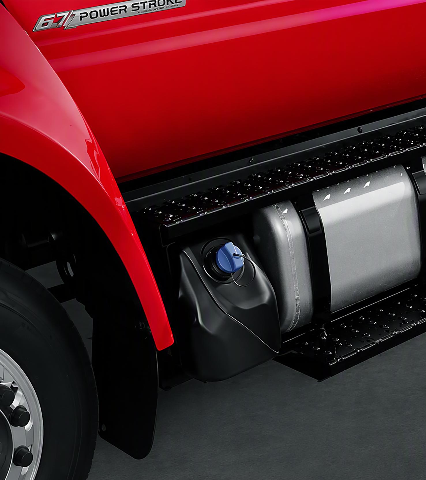 A close-up of running boards and gas tank