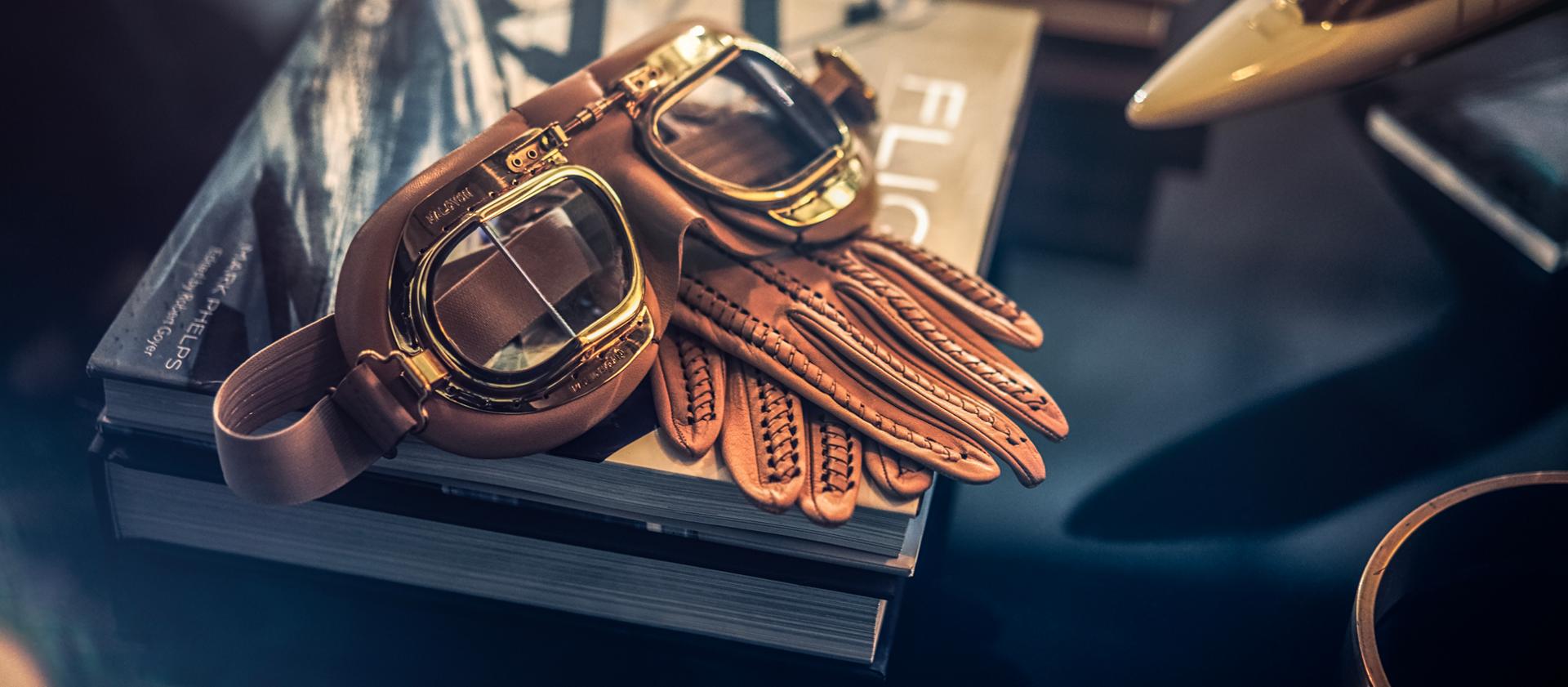 Aviation goggles and gloves hint suggest inspiration of the 2025 Lincoln Black Label Flight theme