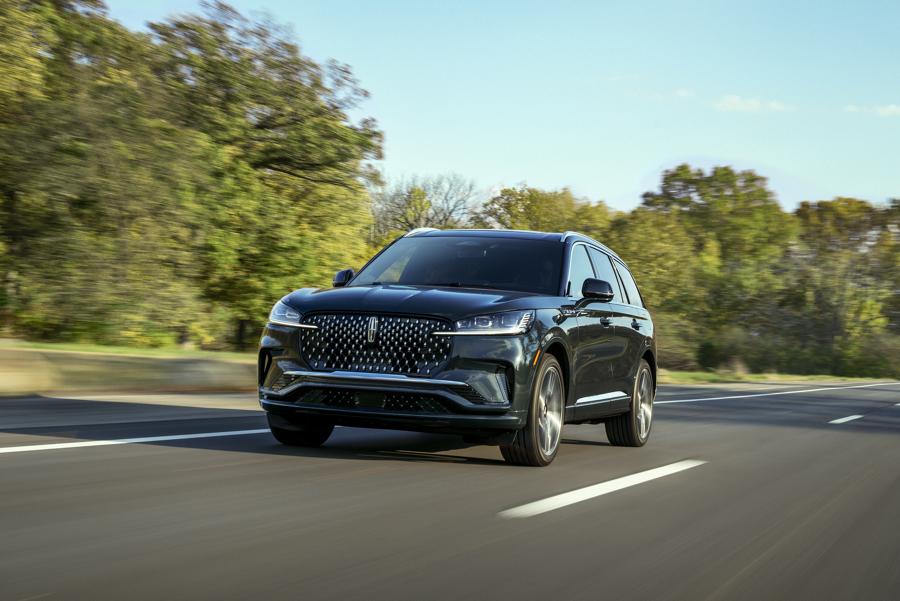 A 2025 Lincoln Aviator® is shown being driven along river valley
