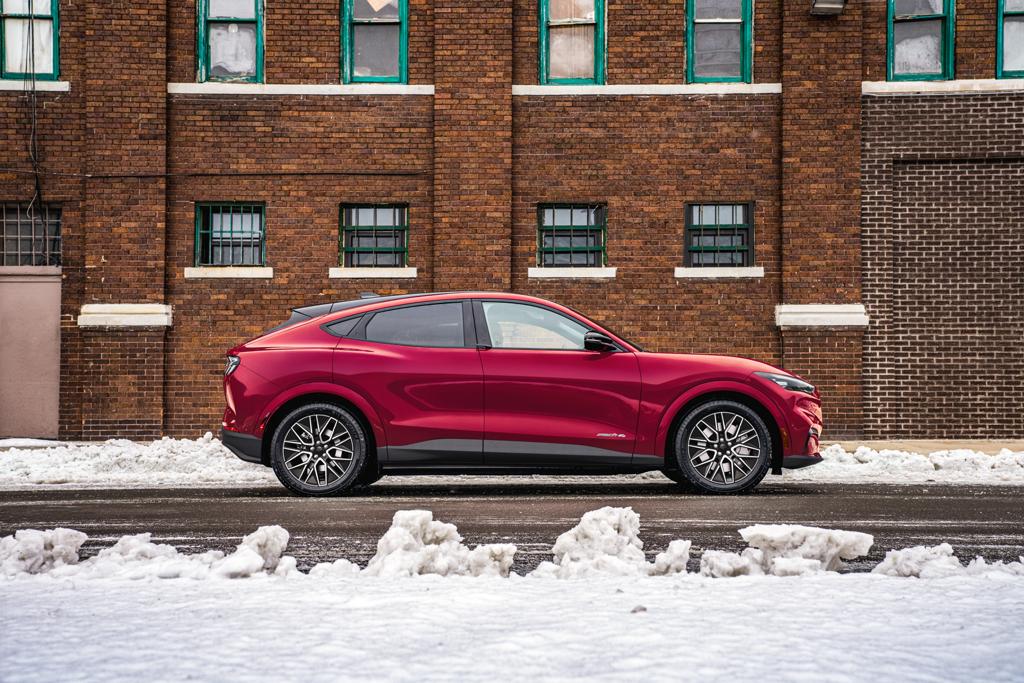 2025 Ford Mustang Mach-E® parked on a city street in the winter