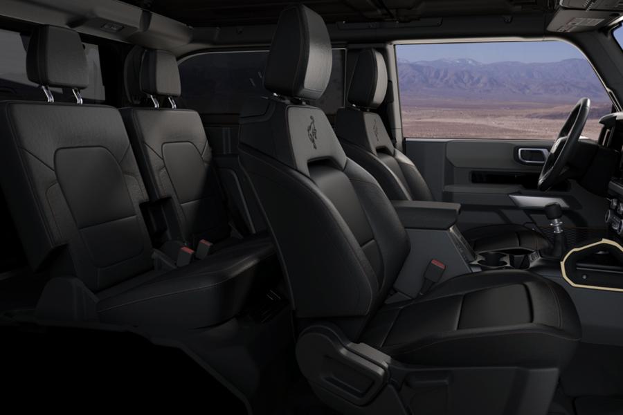 The front seat area of a 2025 Ford Bronco® SUV, showing the marine-grade vinyl seat coverings