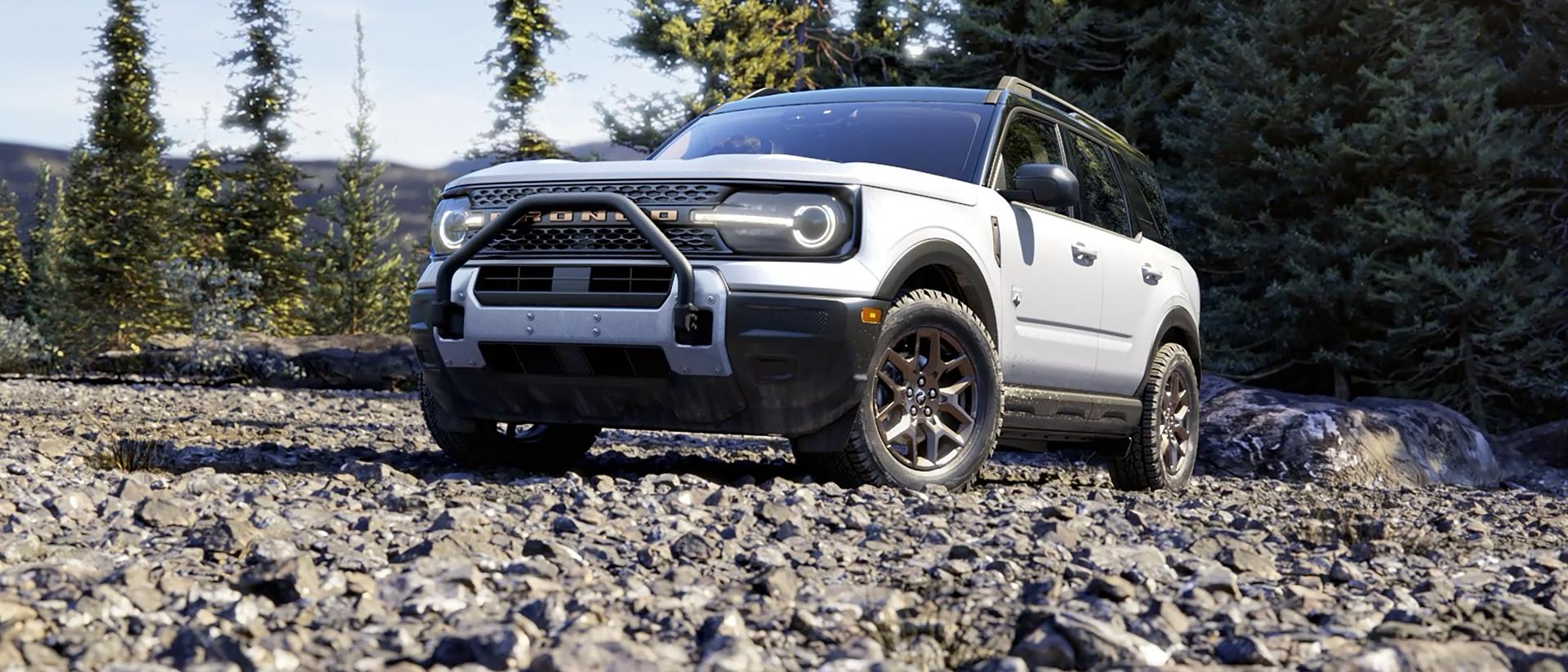 2026 Ford Bronco Sport® parked in the woods surrounded by trees