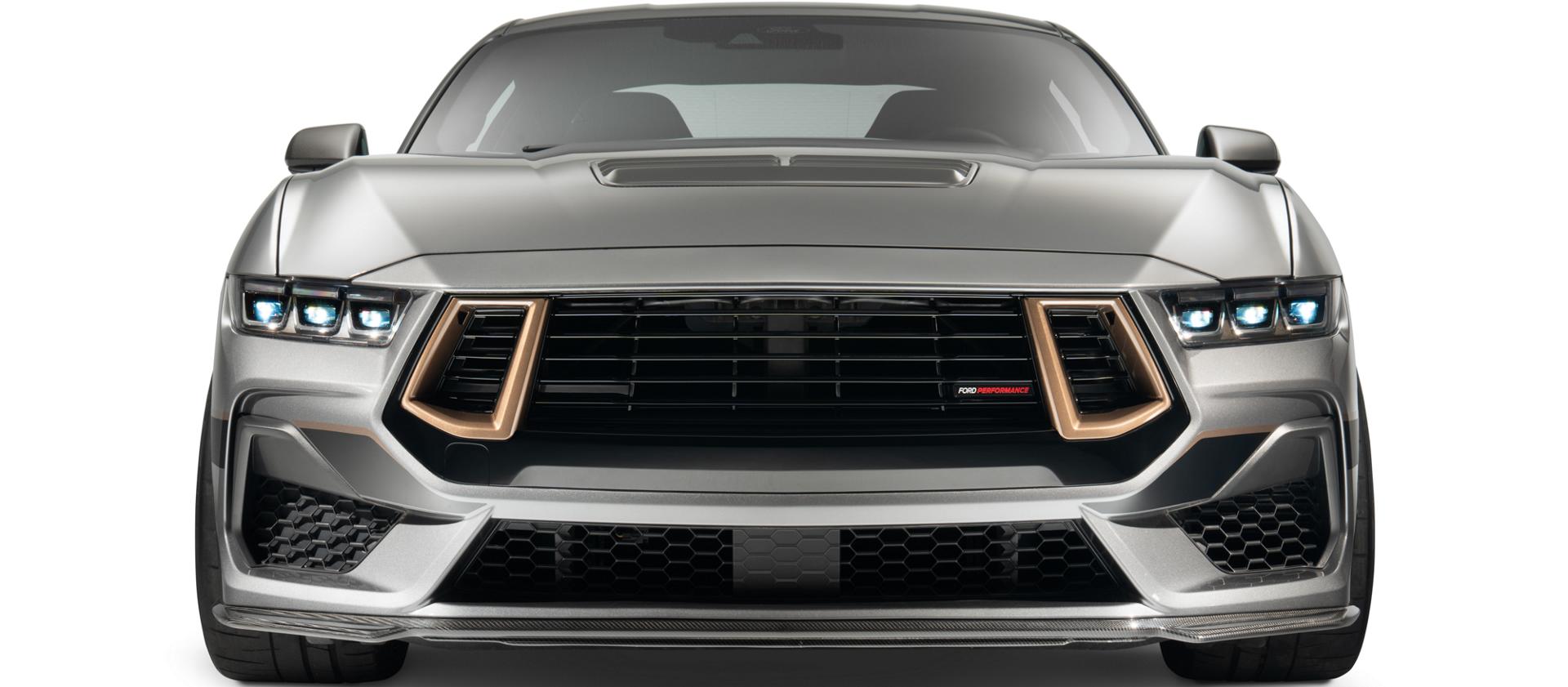 Front view of the gray Mustang showing the modular grille with bronze accents