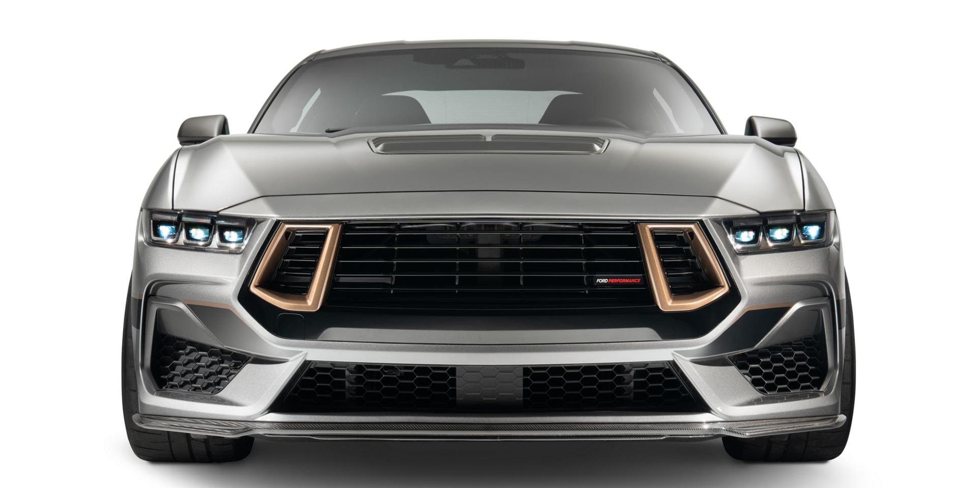 Front view of the gray Mustang FP800S showing the unique modular grille with black inserts and bronze accents
