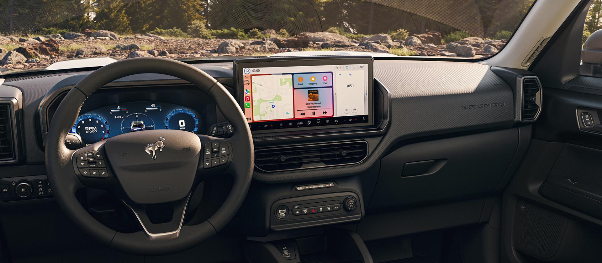 2026 Ford Bronco Sport® interior highlighting the steering wheel and center console screen