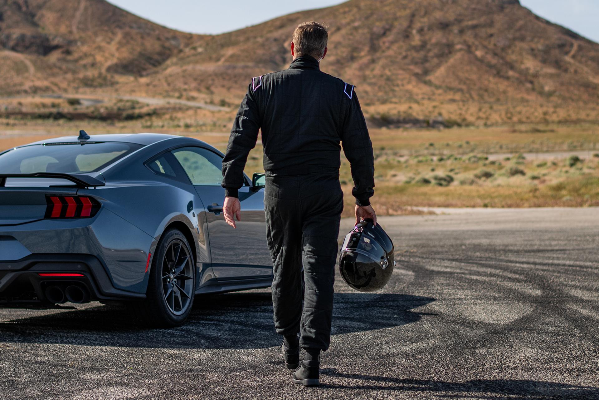 A person carrying a helmet