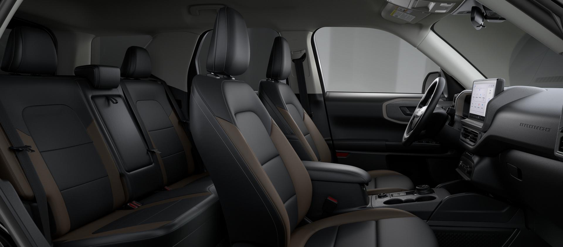 Interior of the vehicle highlighting the seating and the center console screen