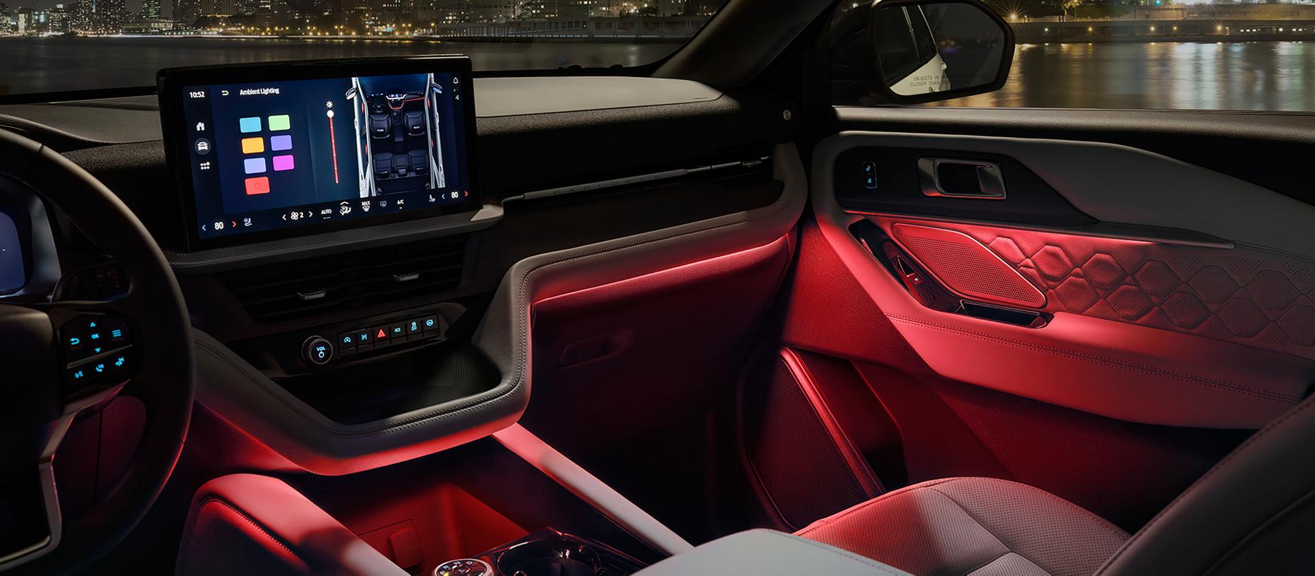 The interior of a 2027 Ford Explorer® SUV with the available ambient lighting turned on