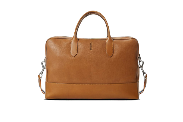 Four men are shown here around a table signing the purchase document for Lincoln in 1922