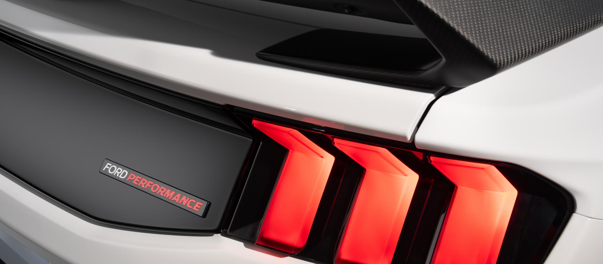 Detail of the Mustang rear taillight and gloss black rear fascia