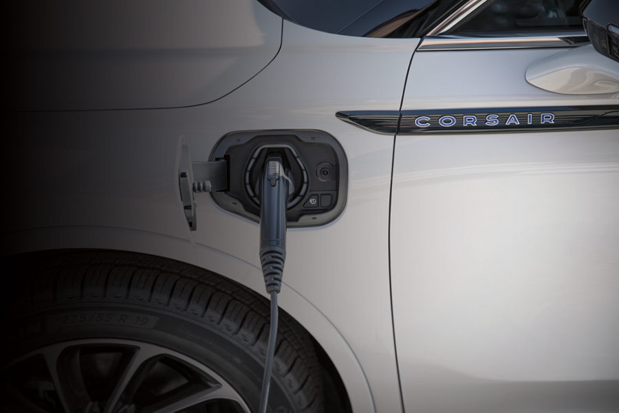A 2025 Lincoln Corsair® Grand Touring SUV is being charged with a Lincoln Mobile Power Cord