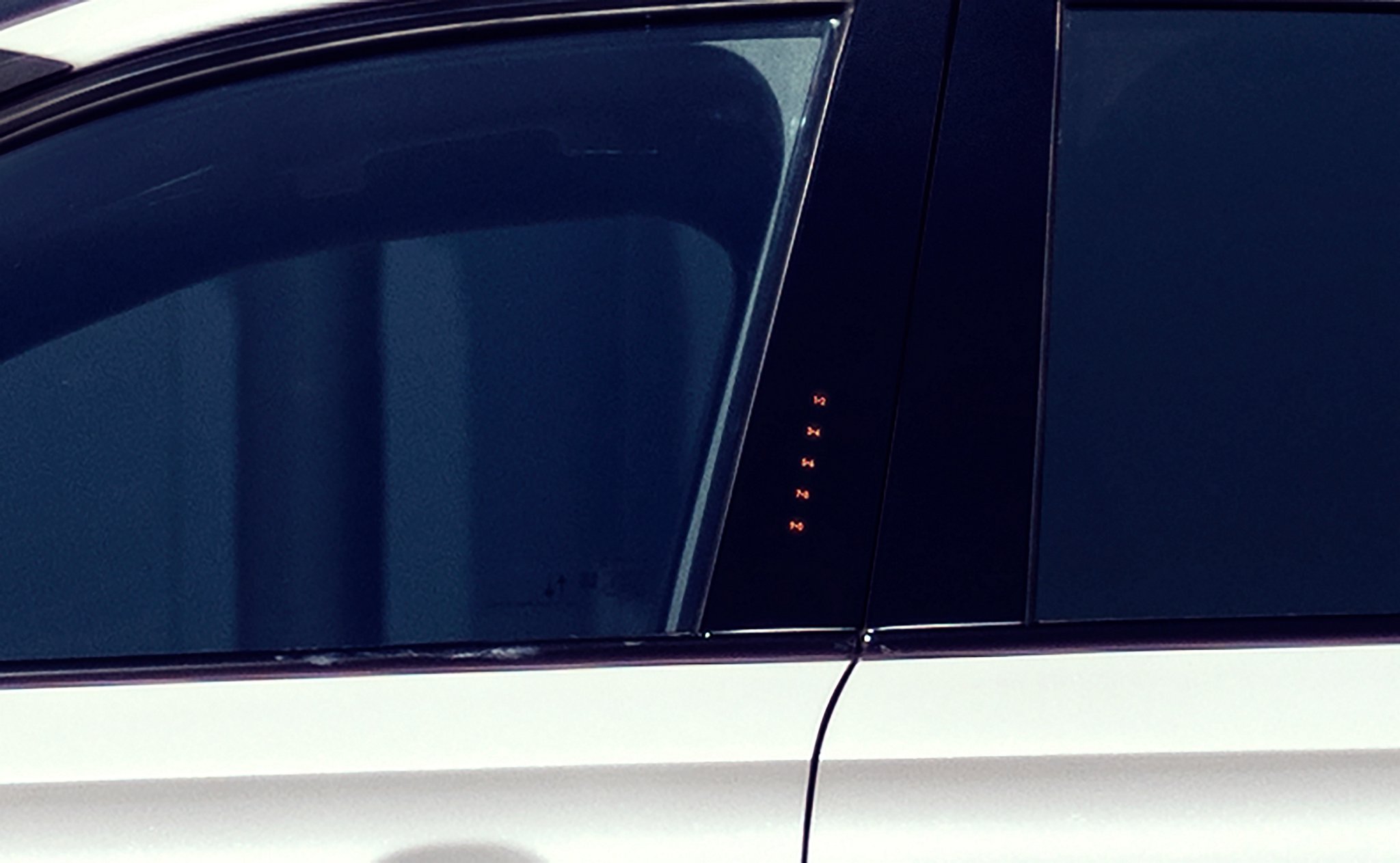 The SecuriCode® Keyless entry pad numbers are illuminated on the outside of the driver's door on a 2025 Lincoln Corsair® SUV
