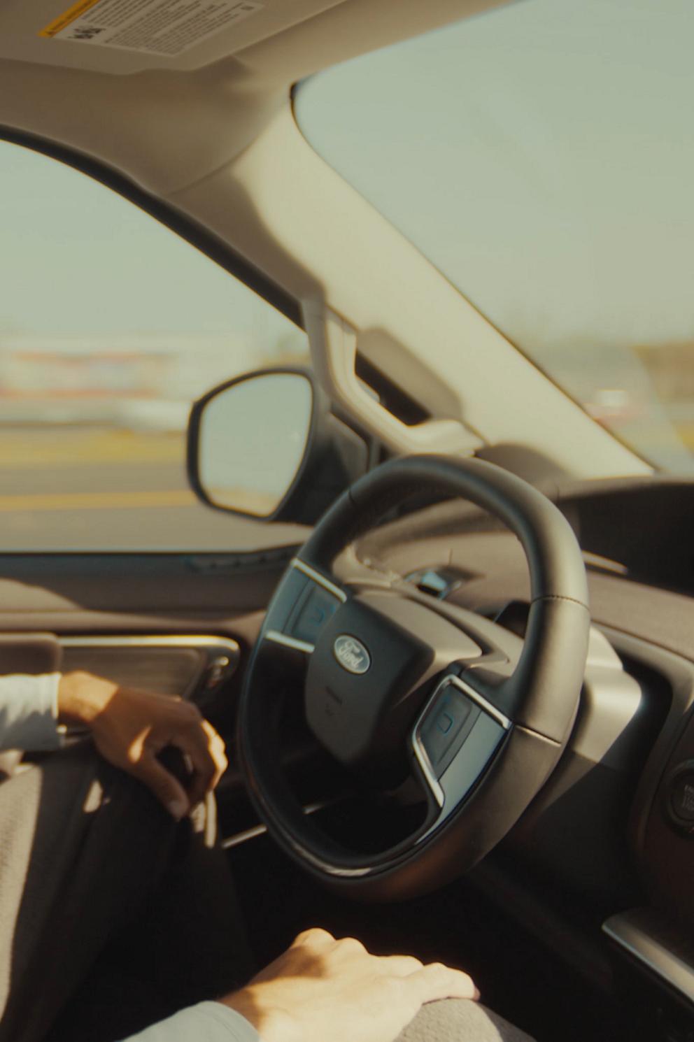 A driver using available Ford BlueCruise in a 2026 Ford Expedition® SUV