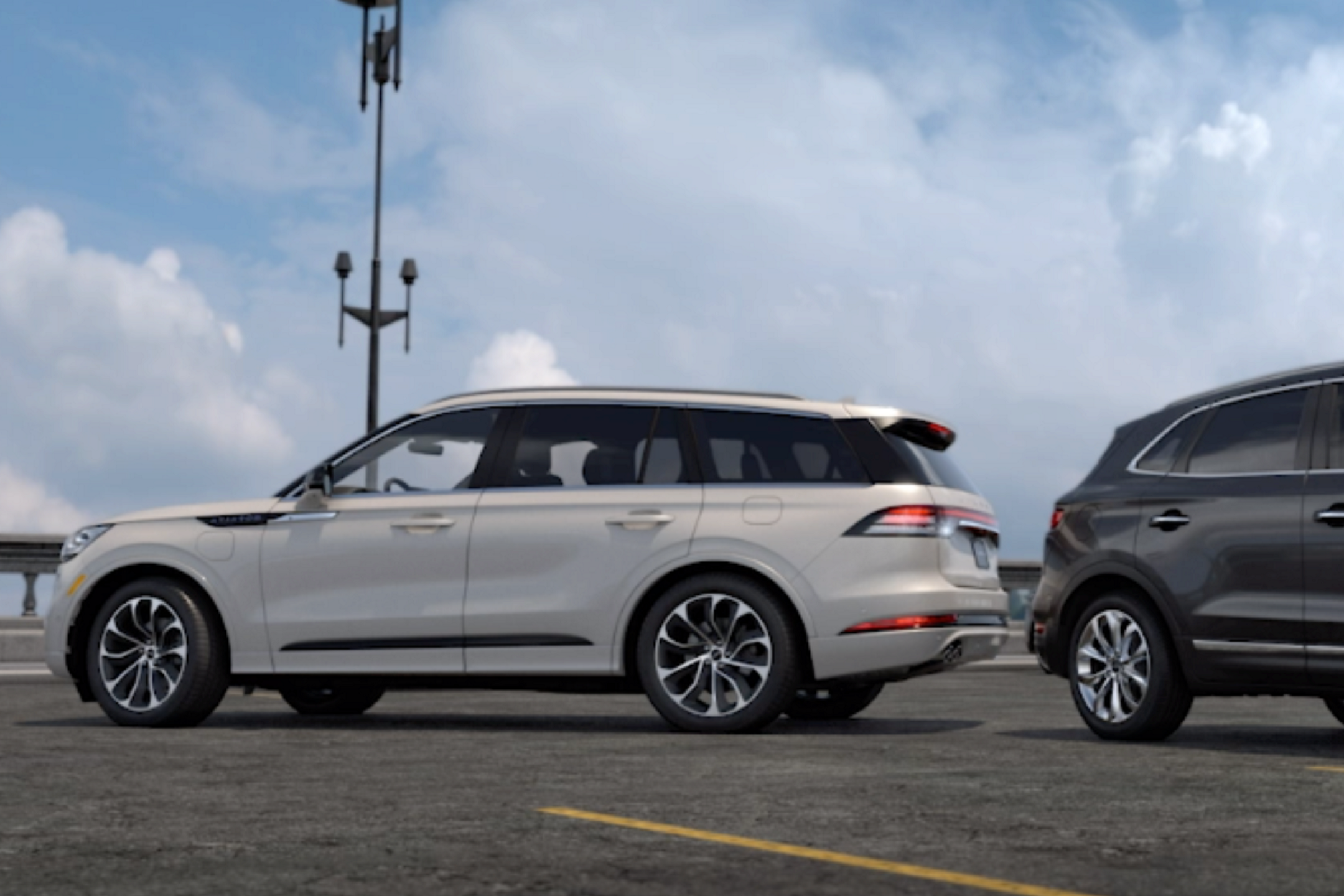 a Lincoln vehicle and another vehicle reversing toward each other is shown here  