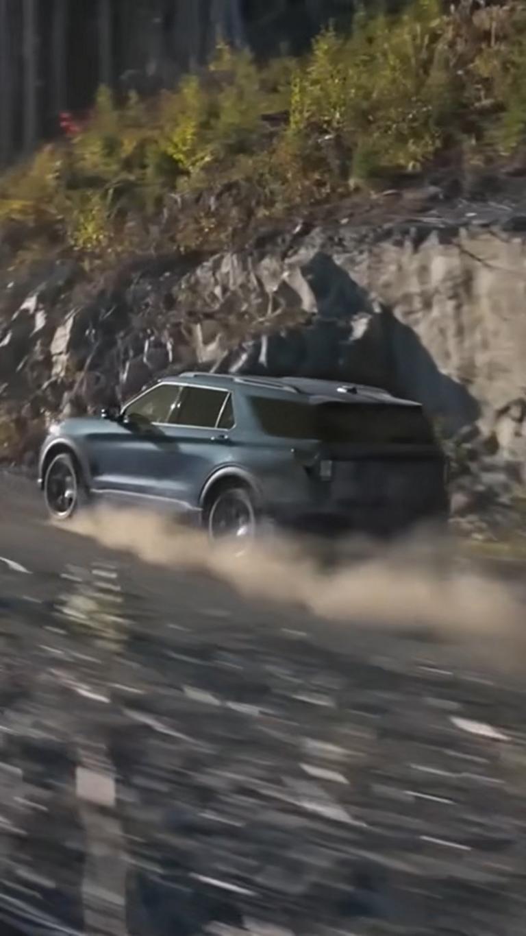 2026 Ford Explorer® ST SUV driving on a dirt road