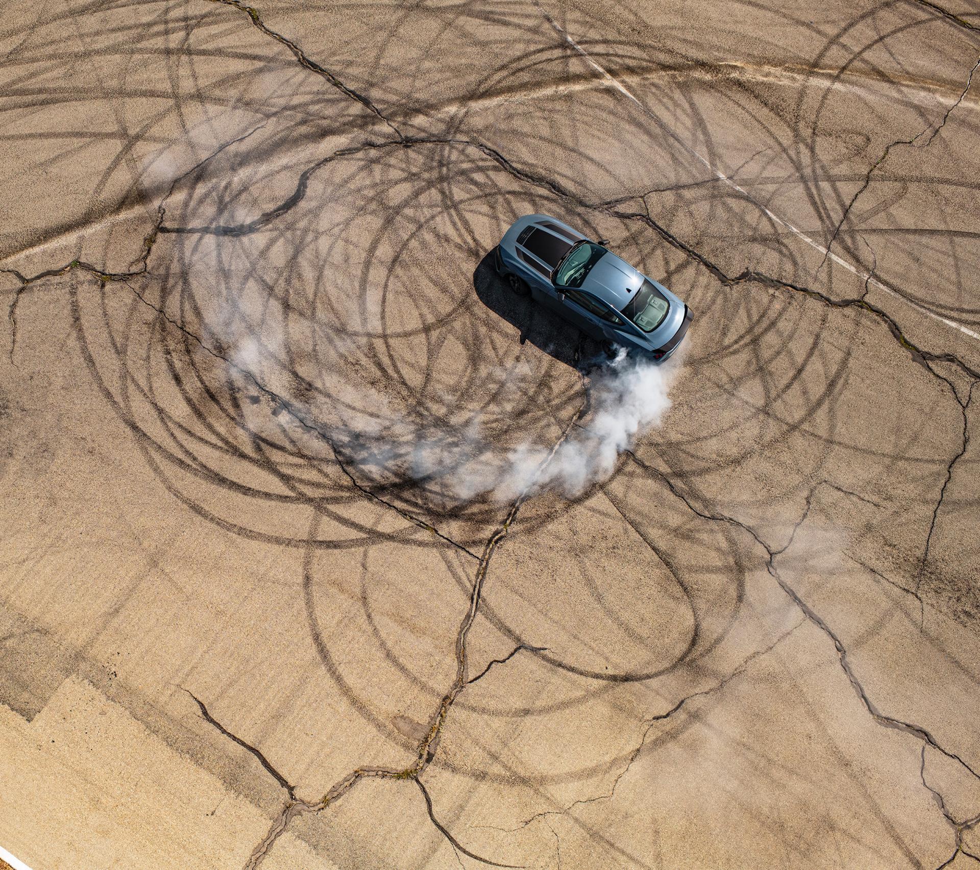 2026 Ford Mustang Dark Horse® Fastback performing burnouts on a closed track