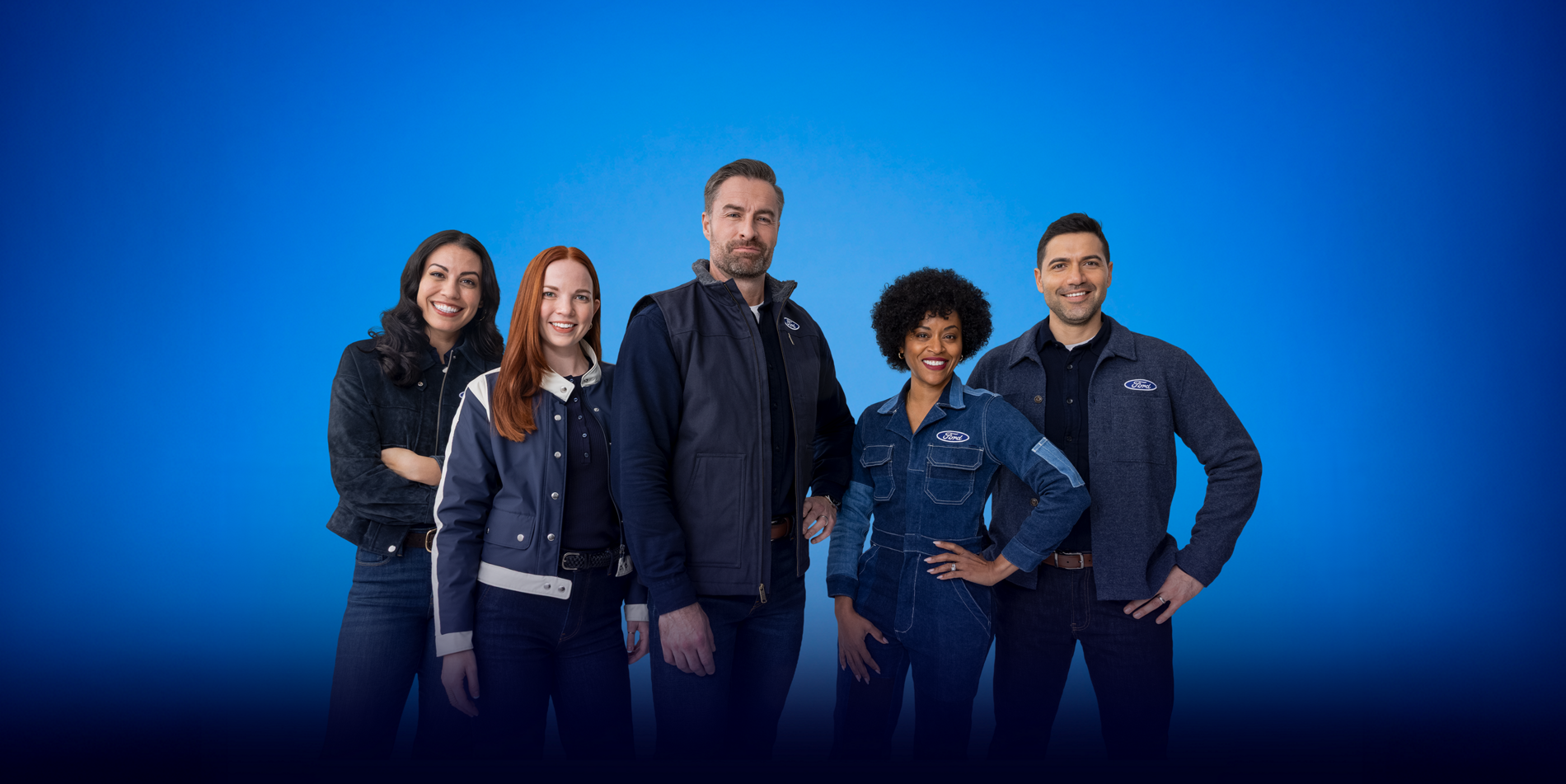 The five members of the Ford Crew standing in front of a blue background, wearing blue jackets
