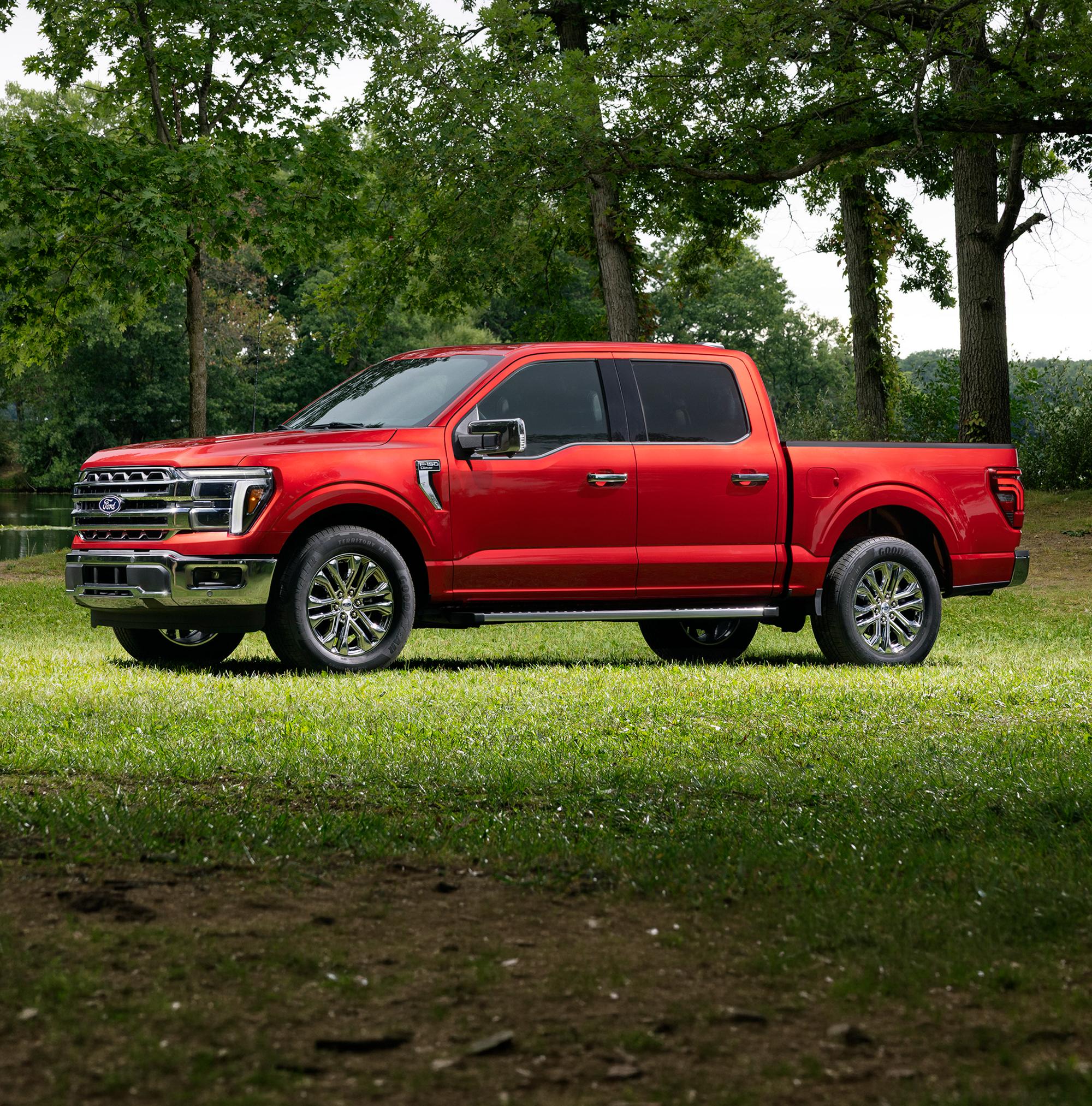 A 2027 Ford F-150® Lariat® model parked in a wooded setting