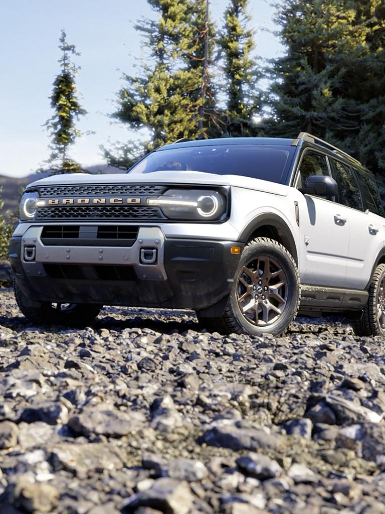 2026 Ford Bronco Sport® parked in the woods surrounded by trees