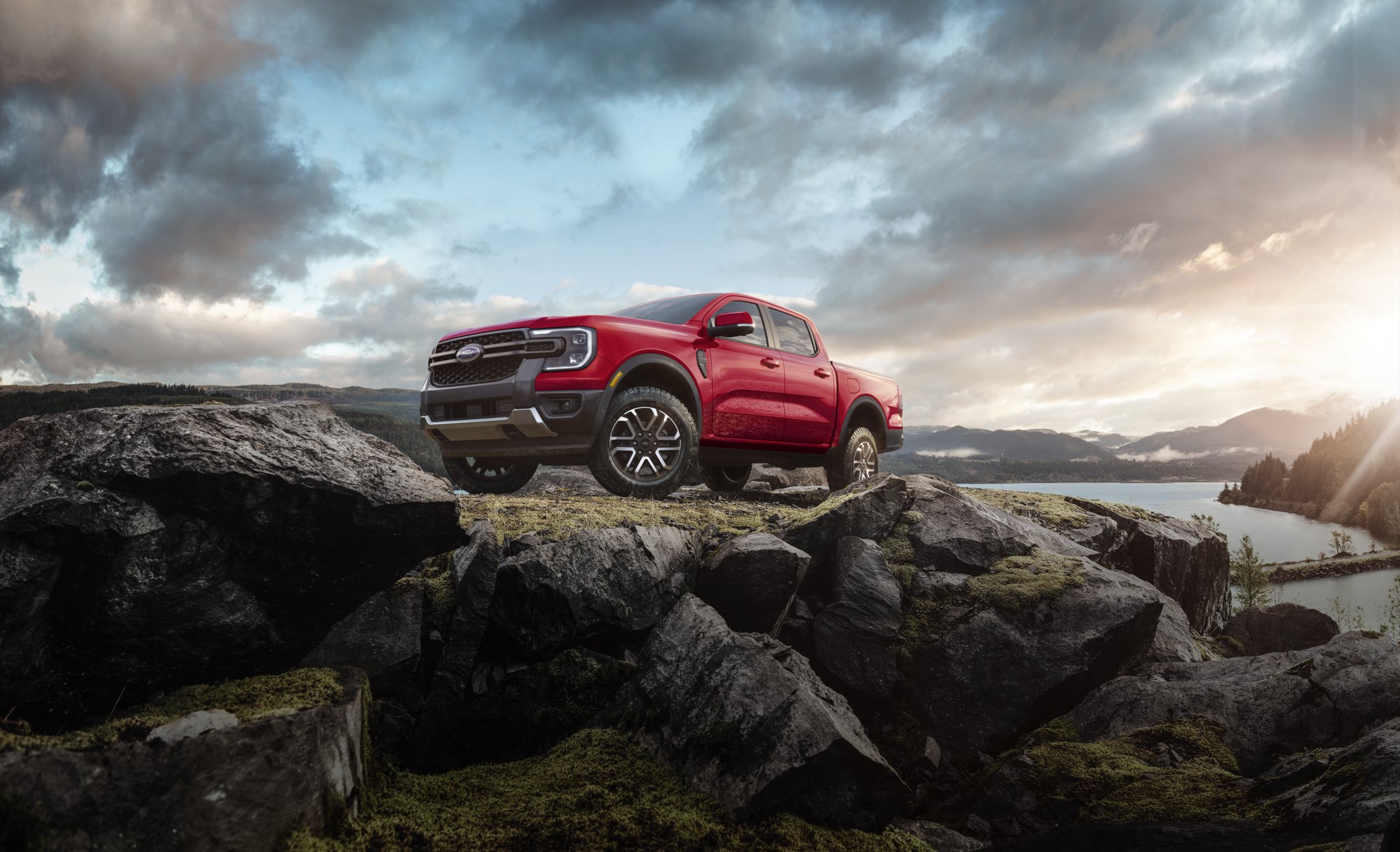 A 2025 Ford Ranger® parked on a rocky hill with the North American Truck of the Year™ award 
