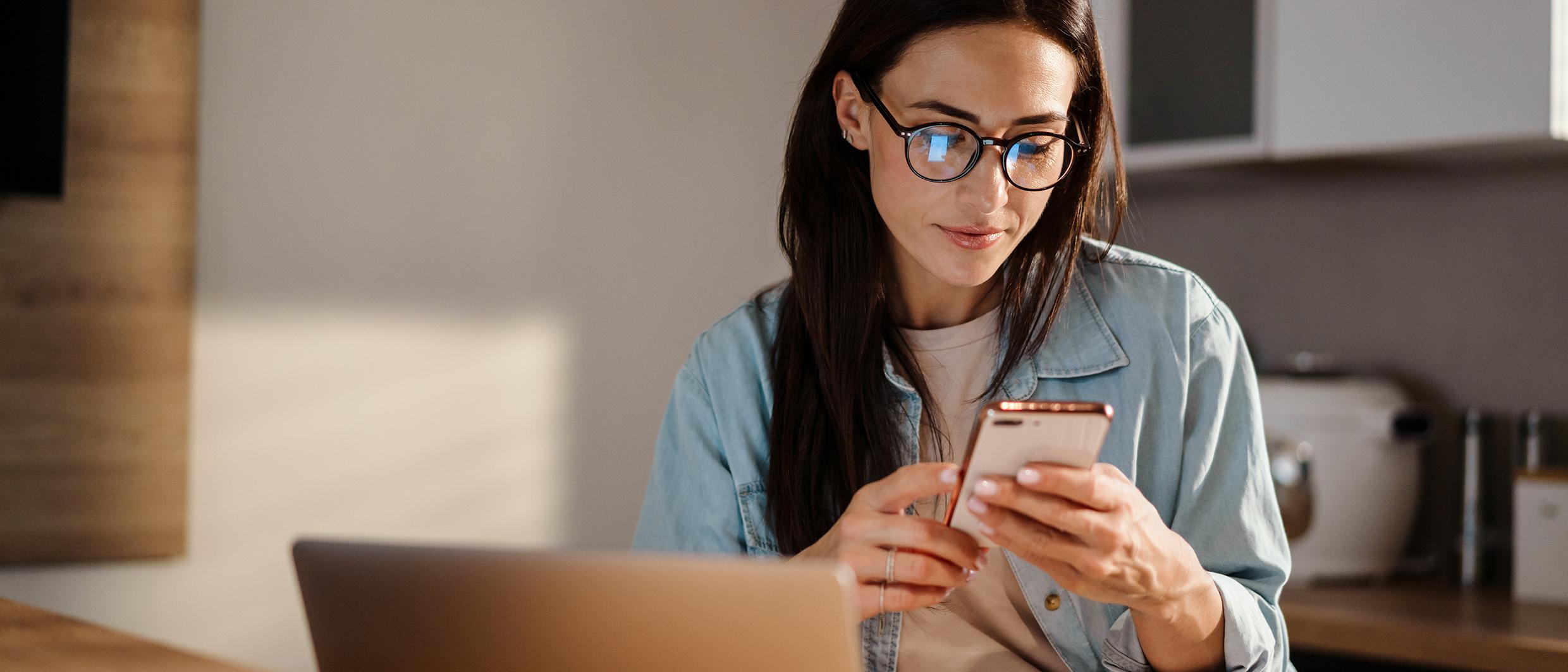 A Ford owner on their smartphone
