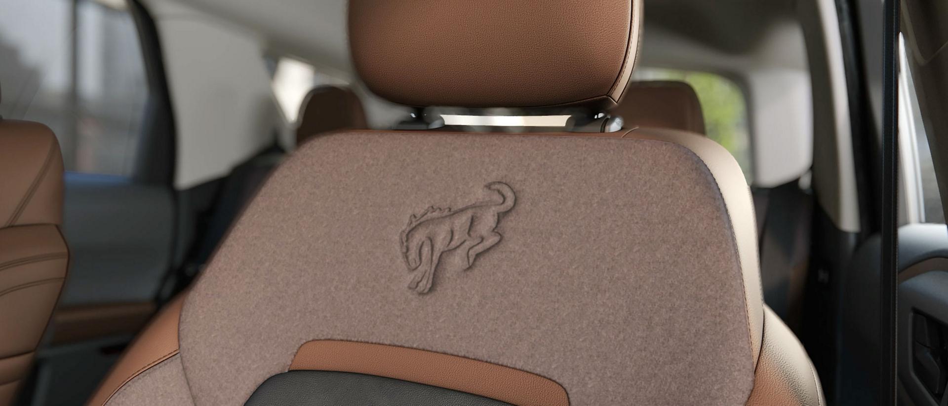 Interior of the vehicle highlighting the seating and the center console screen