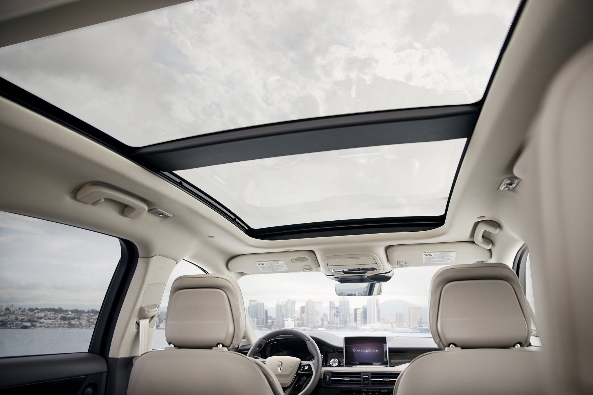 The available panoramic Vista Roof® is seen from inside a 2026 Lincoln Corsair® SUV