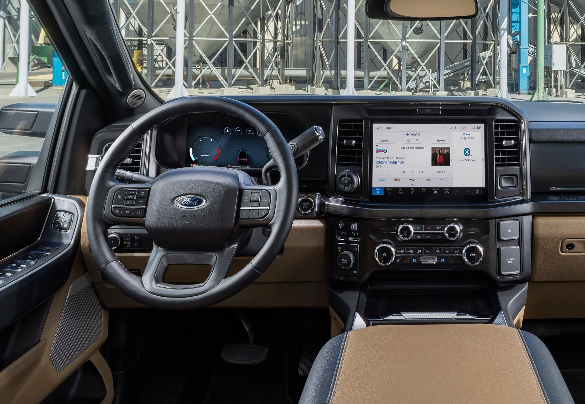 Interior highlighting the steering wheel and center display screen of a 2025 Ford Super Duty® F-350® LARIAT pickup